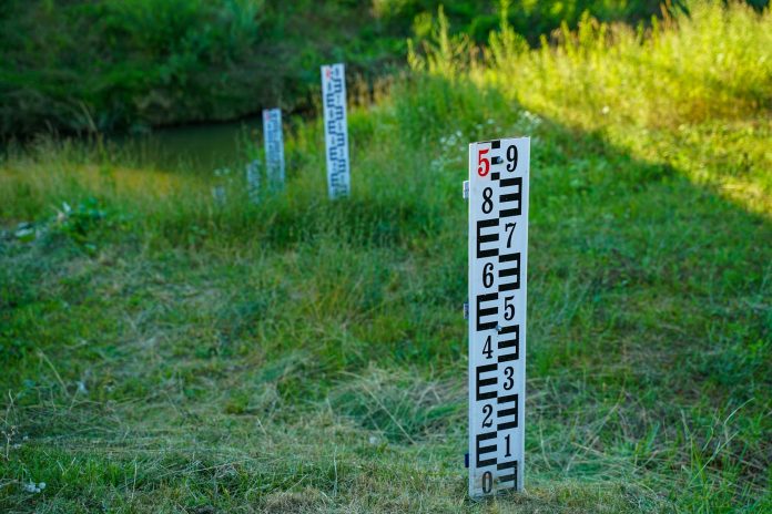 Heart graphic made of red and pink flowing lines, representing romance.